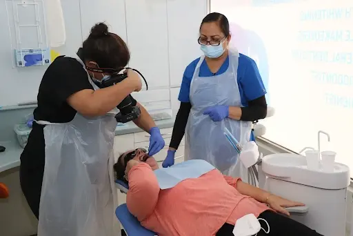 Dentists working on patient